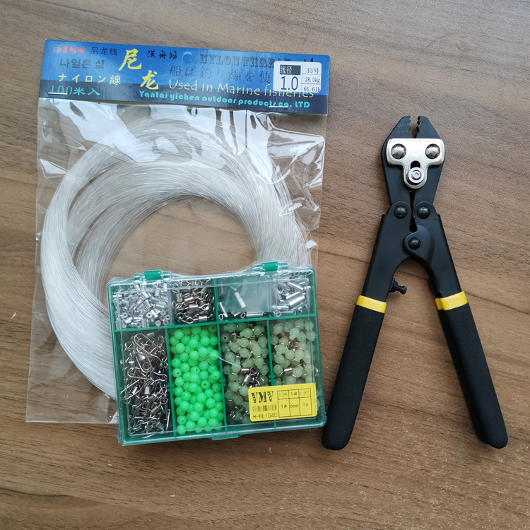 A box of 1.0 accessories + 100 m line + pocket black clamp